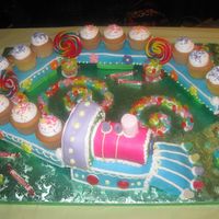 Cupcake Train The train is not cake. The flat bed cars are styrofoam covered in fondant and the engine is RCT. So it was basically a cupcake stand.