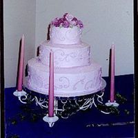 Anniversary Cake This cake was made for my husband's grandparent's 60th wedding anniversary. I made this after 2 classes of Wilton Course I.