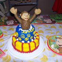 Curious George Monkey Cake I made this curous george cake for my son's first birthday. I just started decorating cakes. this is my second semi 3-d cake