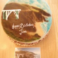 Big Sur Fondant covered 10" cake with airbrushed picture of Big Sur CA taken from a postcard. Bridge was done in buttercream, white chocolate...