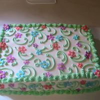 Flowers And Swirls Inspired by Thanh Thanh. I only had 30 min to do this cake for my sister -in-law. I think she really liked it though:) Thanks for looking...