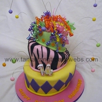 Fun And Funky Birthday Cake Made for my daughter 14th birthday. Bottom tier - chocolate, middle tier - neopolitan (choc, stawberry, vanilla), top tier - vanilla. Had...