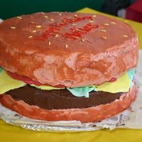 Mcdonald's Cheeseburger Cake My son LOVES McDonald's, so we hosted his 4th birthday party there. I was able to get McDonald's to give me the wrapping paper...