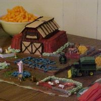 Farm Birthday Cake I made this cake for my son's First Birthday party on June 4th. Everything but the animals is edible. It was really a hit, and...