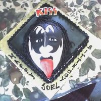 06-13-06_1011.jpg This cake was for my husband that still loves KISS