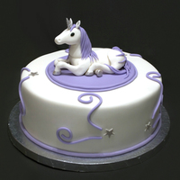 Unicorn Birthday Cake for an adult who loves unicorns. 10" cake, topper is fondant.