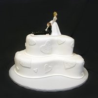 Paisley And Hearts Wedding Cake for a small family wedding. Covered in Fondx. Picture was taken before the board was finished. Comments and constructive criticism...