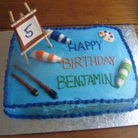 Brandon_And_Superman_2311.jpg I made this cake for my son's fifth birthday -- he wanted an artist cake. Icing is buttercream and everything else is fondant. Easel...