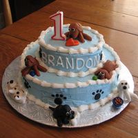 Brandon_And_Superman_1830.jpg I made this cake for my son's first birthday -- he loves dogs. :-) I got a lot of great ideas from this site.