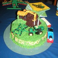 John Deer Cake This cake was made for my 3 year old nephew, He refused to let anyone cut it.