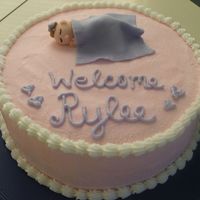 Baby Shower Cake A cake I made for my sister's friends small baby shower. The baby is my first fondant figure I have made.