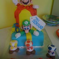 Mario And Luigi Birthday Cake This is a cake for my neighbor's son that loves Mario and Luigi and was very specific on what he wanted on his cake:) Everything is...