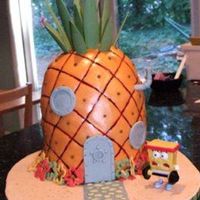 Spongebob's House This was for my son's birthday. 9 in rounds stacked with wonder mold on top and then sculpted. Covered in fondant and dusted/painted....