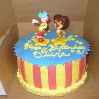 P1000084.jpg JoJo's circus birthday cake. Cake iced in buttercream, with fondant accents.