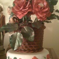 Basket Of Roses gumpaste basket and gumpaste roses on a small dummy cake.
