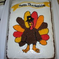 Happy Thanksgiving Cake This was the first cake I decorated after taking the Wilton 1 class. I used the pattern on parchment paper outline with piping gel...