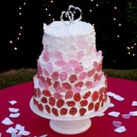 Whimsy Petals Iced in Frostin' Pride and covered with Gum Paste Rose Petals. Boy do those petals take a long time to make! :)