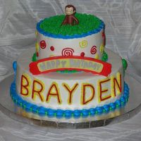 Fesitve Monkey The people who ordered this cake wanted something colorful, festive and they wanted a monkey on it. This is what they got.