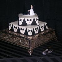 Black And White Tuxedo Groom's Cake Originally the cake was supposed to have chocolate covered strawberries on it.They decided last minute they didn't want the...
