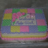 Baby Quilt Cake I saw a version of this cake on the Wilton website and made a few adjustments and made it according to what the mom-to-be wanted.
