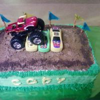Monster Truck Rally Made for a boy's monster truck themed birthday party! Cake was half yellow, half chocolate. Icing was buttercream, and I crushed some...