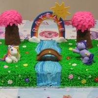 My Little Pony Red Velvet cake w/ Van. BC. All decorations made with fondant. Trees were made from RKT covered in fondant.