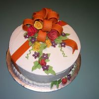 Fall Colors A birthday cake done with flowers in fall colors. The idea came from a wedding cake I did.(in the Square Wedding cakes gallery) Thanks for...
