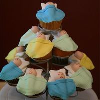 Babyshower Cupcakes made these for a friends baby shower. These are the second ones I made like this. They are fun and easy to make. This time I added a...