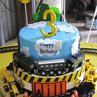 Trains & Road Construction! 10" & 8" cakes with buttercream. All accents are fondant. Cookies were used for the sand & dirt. Train & Road...