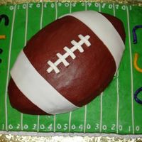 For The Lsu And Saints Fan. Strawberry cake with buttercream frosting and fondant accents.The guy is a huge LSU and Saints fan so he wanted them both on the cake.