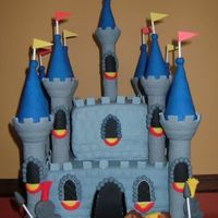 Zackery's Birthday Cake I made this for my grandson's 6th birthday. It took a total of 14 hours. I used the Wilton Castle Cake set. The cakes were 6" &...