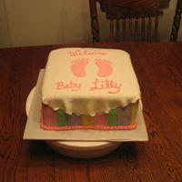 Baby Lilly This was a cake for a co-worker's baby shower. It was double chocolate cake with chocolate frosting, the mom's request. I had a...