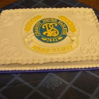 Relief Society Birthday Celebration Sheet Cake This cake is just a basic white half sheet cake with buttercream icing, fondant plaque, and royal icing accents. It was a challenge for me...