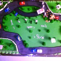 Race Day All the decorations on this cake was made with royal icing and color flow. I really had a great time being creative. I am still learning...