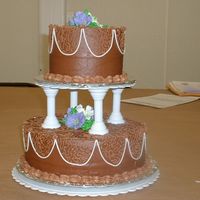 Course 3 Final Cake this is a chocolate cake with chocolate buttercream icing and filled with chocolate fudge... My husband and I just celebrated our 10th...