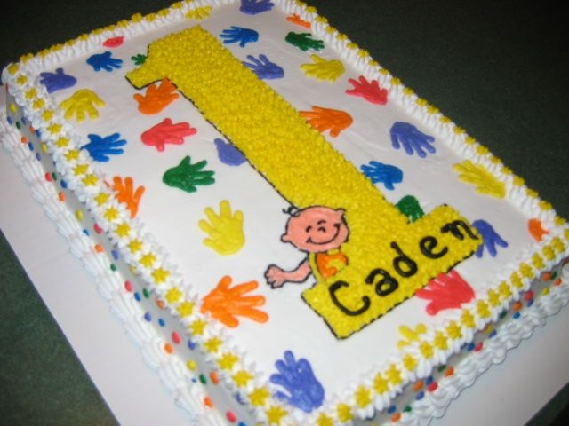 1St Birthday All buttercream frosting. This cake was made to match the birthday invitation. All artwork was free handed onto cake. I tried to make a...