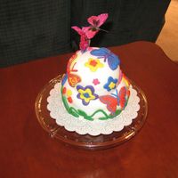 Butterfly Fantasy Devil's Food Cake, Seedless raspberry preserve filling (top tier), Marshmallow filling (bottom tier), Vanilla buttercream frosting,...