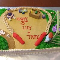 Playground Cake This is a buttercream cake decorated with fondant figures and fondant decorations. I tried to make everything edible but my fondant swing...