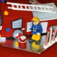Fireman Sam Cake All white fondant icing. Took about 8 hours, but the kids loved it!