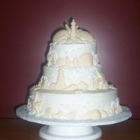 Zeena's Seashell Wedding Cake 3 tier (2 yellow , 1 choc), white chocolate shells, nothing fancy. I loved making this cake.