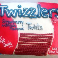 Twizzlers full sheet decorated to look like a bag of twizzlers, for a grooms cake. Red Velvet cake Strawberry filling.