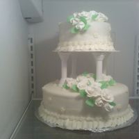 Wilton Final Cake I hurt my arm a few days before making this cake so I had to go out and "buy" the dam roses. At least it was my parents...