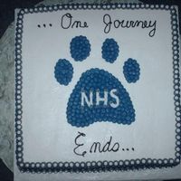 Journey Begins These were two cakes for a graduation. It was a neat set-up on the table.