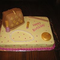 Purse Pearls Make-Up 11x15 sheet cake with fondant covered purse cake, fondant pearls and chocolate make-up