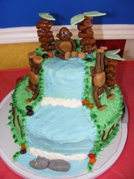 Monkey Cake I made this cake for my son's 7th birthday. The top layer was chocolate. The bottom layer was french vanilla with oreo filling, yum!...