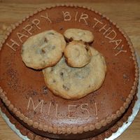 Happy Birthday Miles This cake was made for a co-worker. He really loves my chocolate chip cookies, so that's the kind of cake I made for him. :)