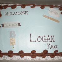 Baby Shower Cake Baby shower cake with whipped icing, using scrapbooking embellishments