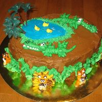 Lions, Tigers, Bears - Oh My! (And Some Crocodiles Too!) This is my first attempt in doing figure piping with buttercream.. at first I wasnt sure whether they look like lions, tigers, bears or...