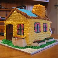 Little Yellow Cottage This is my first attempt at a 3D cake. Made with buttercream.