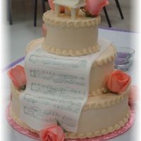 Piano Cake Yellow cake with white chocolate piano, fondant sheet music.